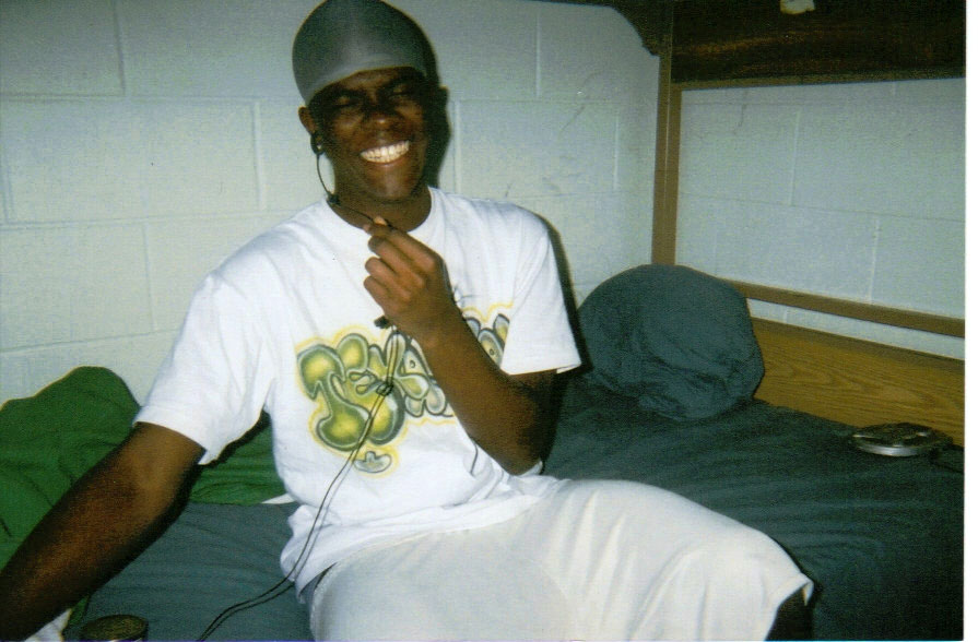 Brent in his barracks talking on the phone with one of his biggest supporters, Josh Williams.